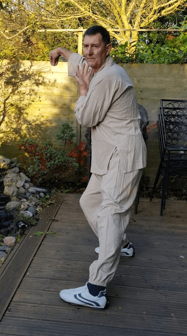 Jeremy practising a Tai Chi posture